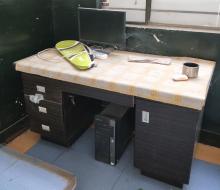 The only computer in the teacher’s office at an elementary school sits unused because it’s not connected to the Internet.