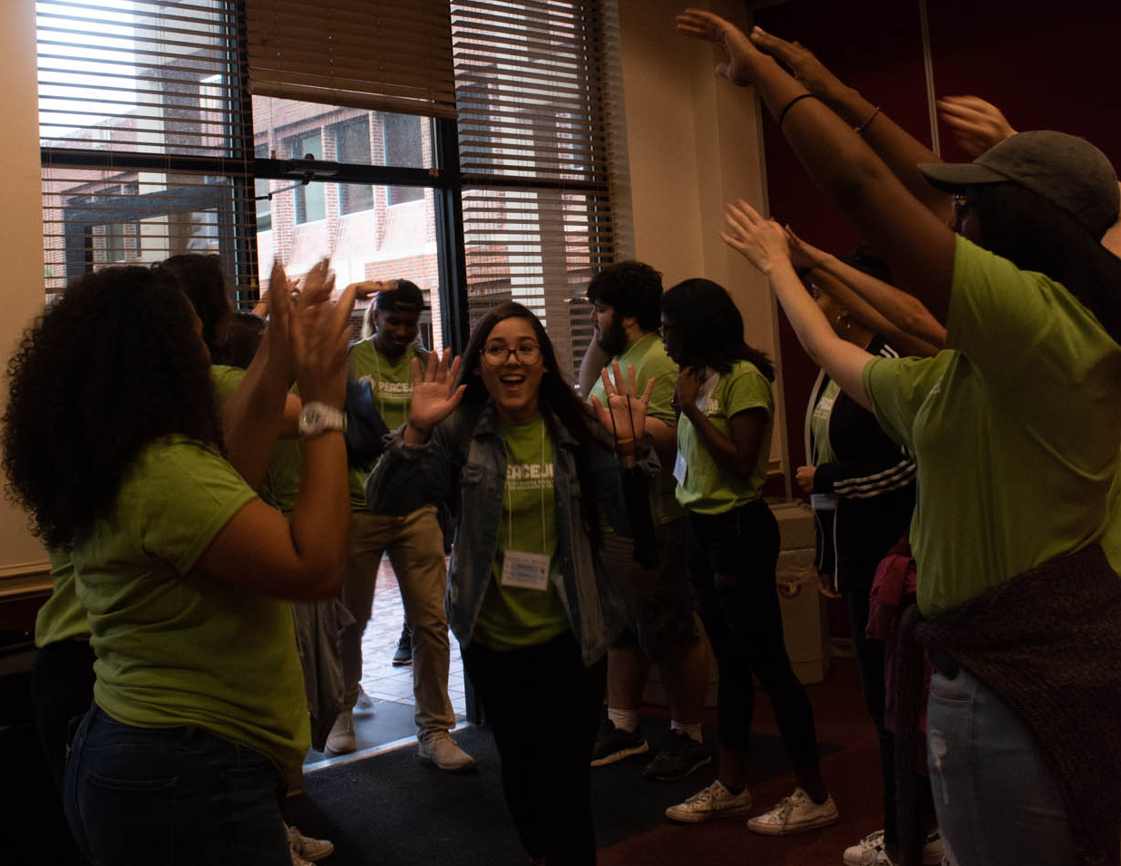 PeaceJam student attendees receive a warm and enthusiastic welcome from FSU student mentors for the 2018 PeaceJam Slam.