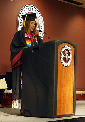 Graduate Stephanie Urbina reflects on her journey as a student at FSU during Thursday's V-rak-ke-ce-tv Cultural Graduation Ceremony.