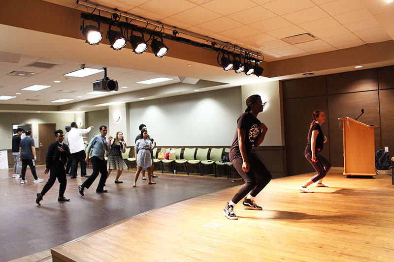 MLS participants engaging in a dance activity as part of a presentation