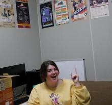 Girl in yellow sweatshirt.