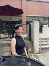 Trinity sits outside argo tea